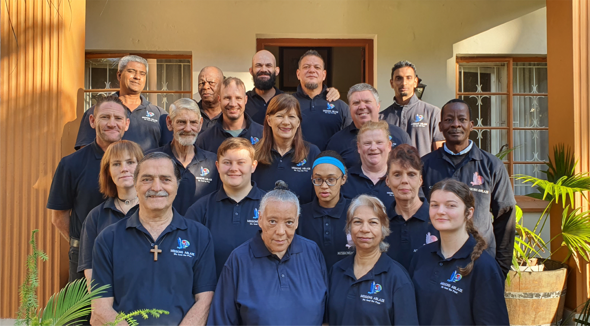 Our Story The Missions Ablaze team on the steps at the Ablaze Centre in Tongaat